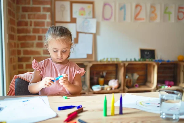 Beautiful Blond Toddler Girl Drawing Colored Pencils Kindergarten — ストック写真