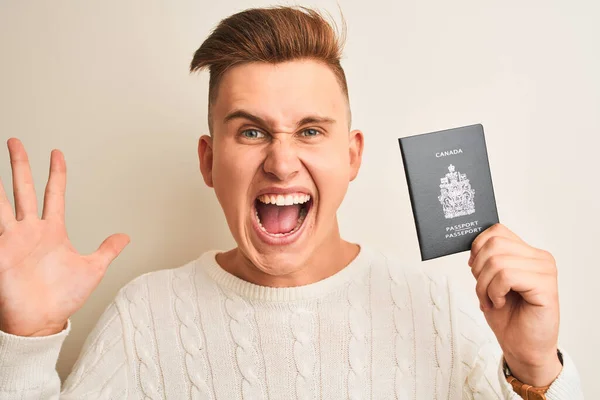 Junger Gutaussehender Mann Mit Kanadischem Pass Vor Isoliertem Weißem Hintergrund — Stockfoto