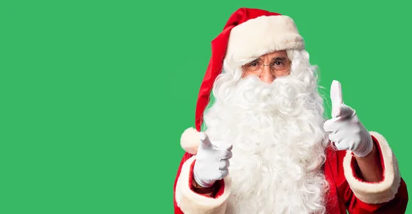 Orta Yaşlı Yakışıklı Noel Baba Kostümü Giymiş Sakallı Bir Adam — Stok fotoğraf