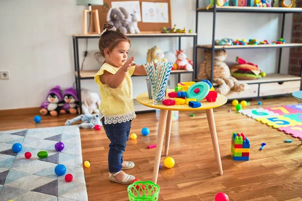 Beautiful Toddler Playing Striped Straws Standing Kindergarten — Stock Photo, Image