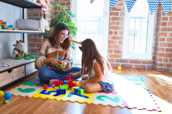 Beautiful Teacher Toddler Playing Building Blocks Toy Lots Toys Kindergarten — Stock Photo, Image