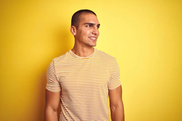 Young Handsome Man Wearing Striped Shirt Yellow Isolated Background Looking — Stock Photo, Image