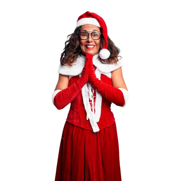 Mulher Meia Idade Vestindo Traje Papai Noel Orando Com Mãos — Fotografia de Stock
