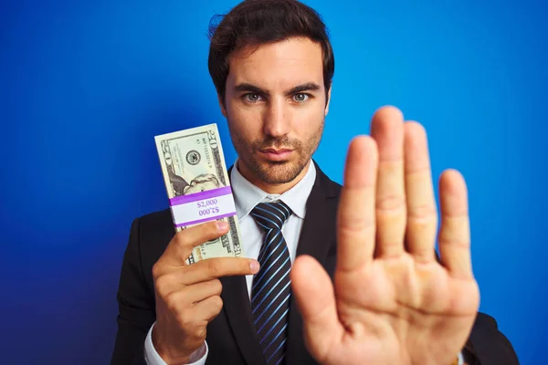 Young Handsome Businessman Wearing Suit Holding Dollars Isolated Blue Background — Stock Photo, Image