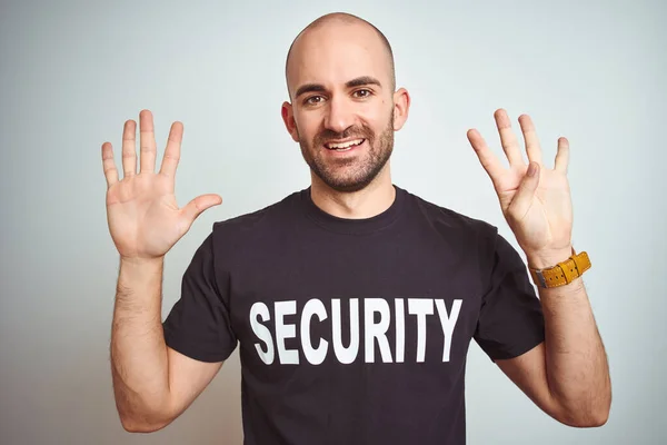 Young Safeguard Man Wearing Security Uniform Isolated Background Showing Pointing — Stock Photo, Image