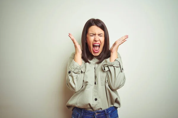 Young Beautiful Brunette Woman Wearing Green Shirt Isolated Background Celebrating — Stock Photo, Image