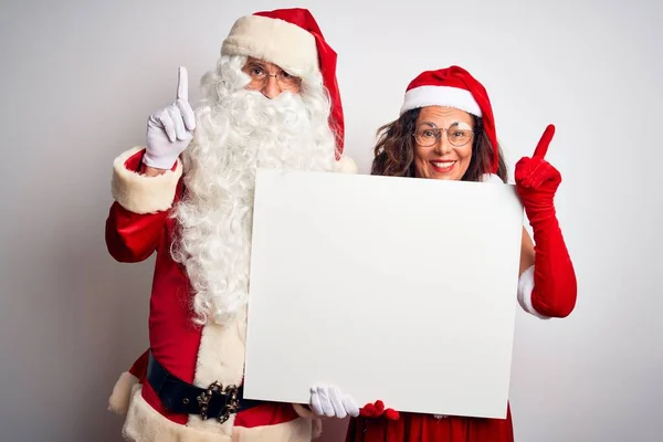 Senior Couple Wearing Santa Claus Costume Holding Banner Isolated White — 图库照片