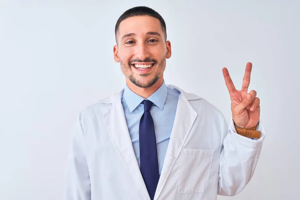 Young Doctor Man Wearing White Coat Isolated Background Smiling Happy — Stock Photo, Image