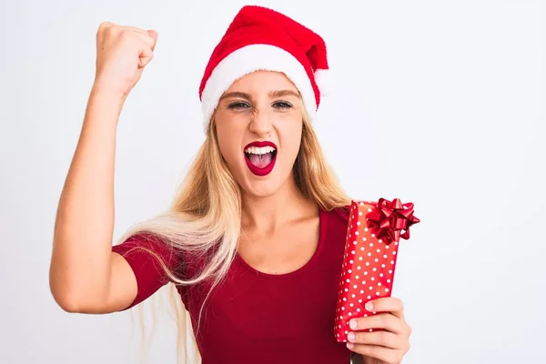 Beautiful Woman Wearing Christmas Santa Hat Holding Gift Isolated White — 스톡 사진