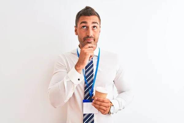 Young Handsome Business Man Wearing Pass Drinking Coffee Isolated Background — Stockfoto