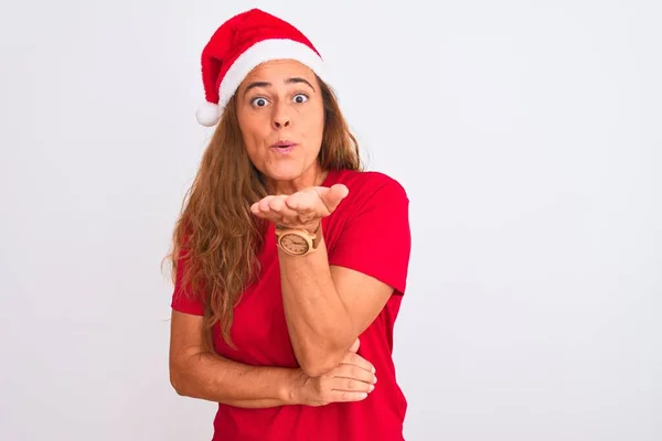 Middelbare Leeftijd Volwassen Vrouw Dragen Kerstmuts Geïsoleerde Achtergrond Kijken Naar — Stockfoto