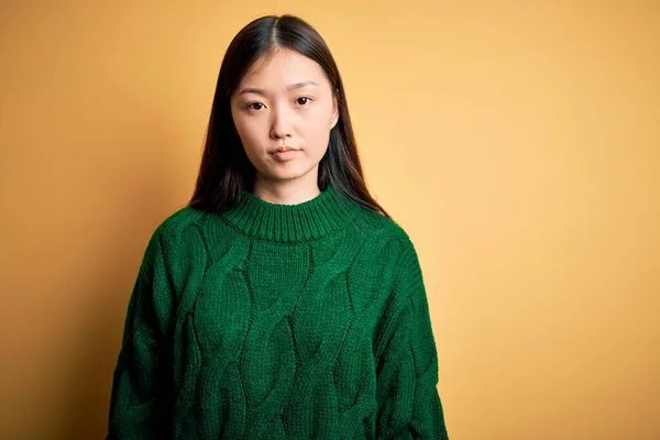 Young Beautiful Asian Woman Wearing Green Winter Sweater Yellow Isolated — Stock Photo, Image