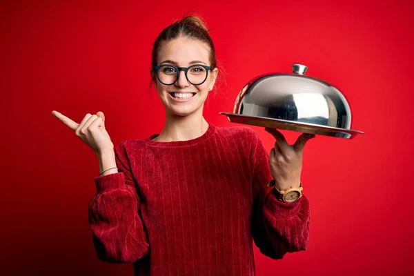 Young Beautiful Redhead Woman Holding Waitress Tray Isolated Red Background — Stock Photo, Image