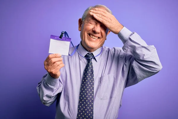 Senior Grey Haired Business Man Holding Identification Tag Purple Background — Stock Photo, Image