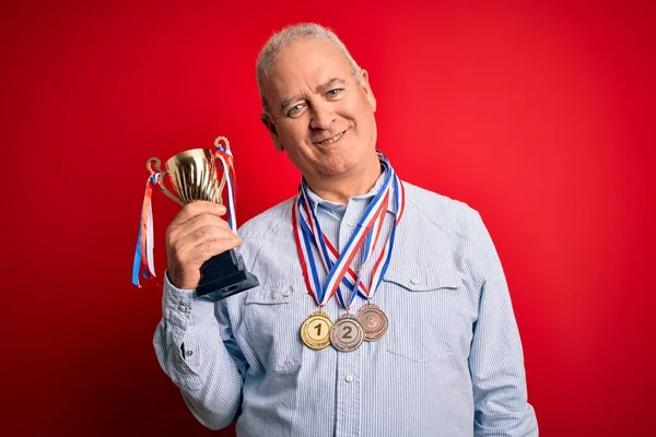Middle Age Hoary Successful Man Wearing Medals Holding Trophy Isolated — Stock Photo, Image
