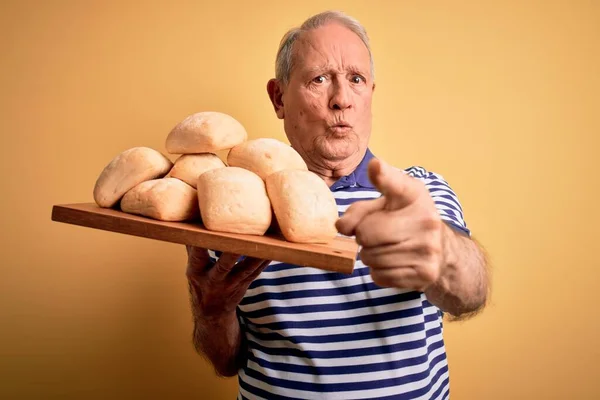 Senior Grey Haired Baker Man Holding Fresh Homemade Bread Yellow — Stock Photo, Image