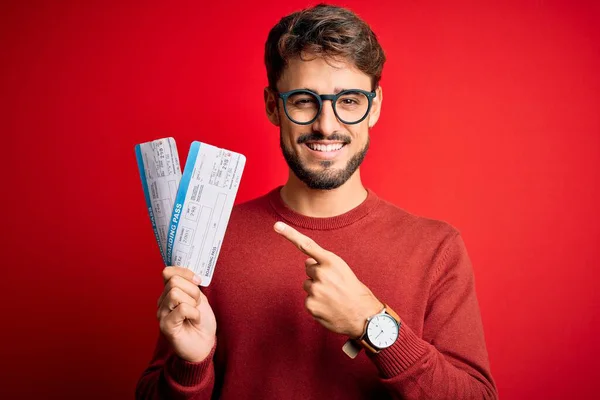 Young Tourist Man Vacation Holding Boarding Pass Standing Red Bakground — Stock Photo, Image