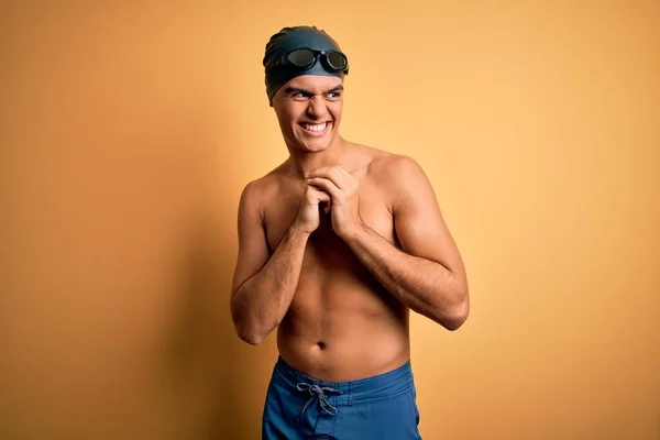 Young Handsome Man Shirtless Wearing Swimsuit Swim Cap Isolated Yellow — Stock Photo, Image