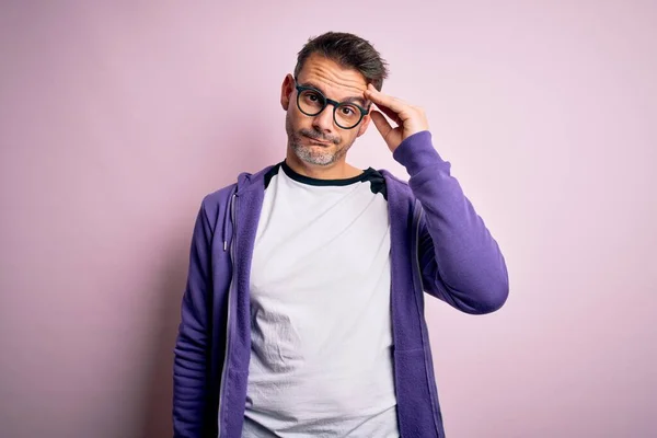 Young Handsome Man Wearing Purple Sweatshirt Glasses Standing Pink Background — Stock Photo, Image