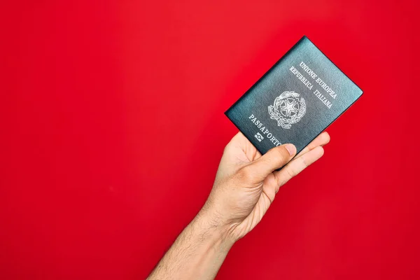 Vacker Hand Man Håller Italiensk Pass Identifiering Över Isolerad Röd — Stockfoto