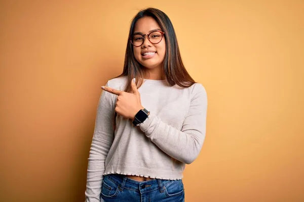 Young Beautiful Asian Girl Wearing Casual Sweater Glasses Yellow Background — Stock Photo, Image
