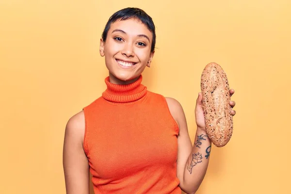 Young Woman Holding Wholemeal Bread Looking Positive Happy Standing Smiling — Stock Photo, Image