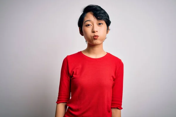 Young Beautiful Asian Girl Wearing Casual Red Shirt Standing Isolated — Stock Photo, Image