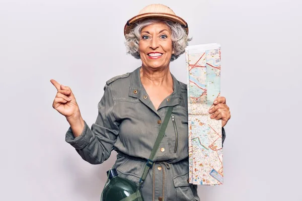 Senior Grey Haired Woman Wearing Explorer Hat Holding Map Smiling —  Fotos de Stock