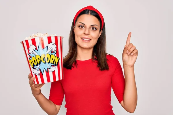 Young Beautiful Brunette Woman Eating Pack Popcorns Snack Isolated White — Stock Photo, Image