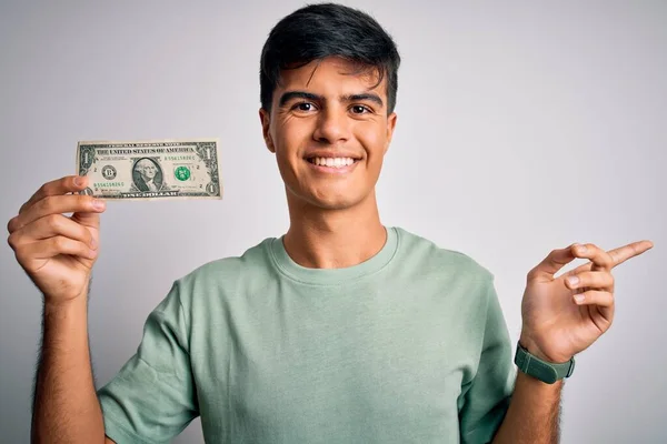 Junger Gutaussehender Mann Hält Ein Dollar Scheine Über Isoliertem Weißem — Stockfoto