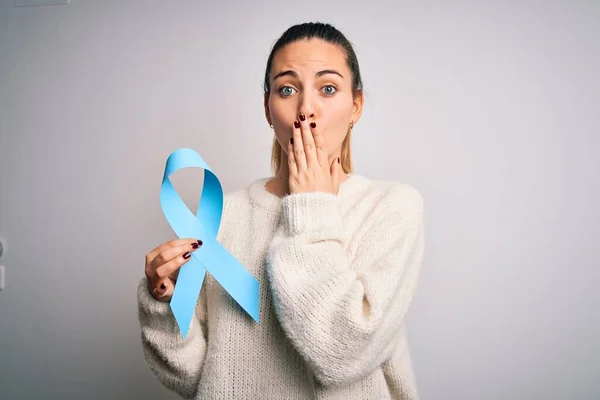 Young Beautiful Blonde Woman Holding Blue Cancer Ribbon Isolated White — Stock Photo, Image