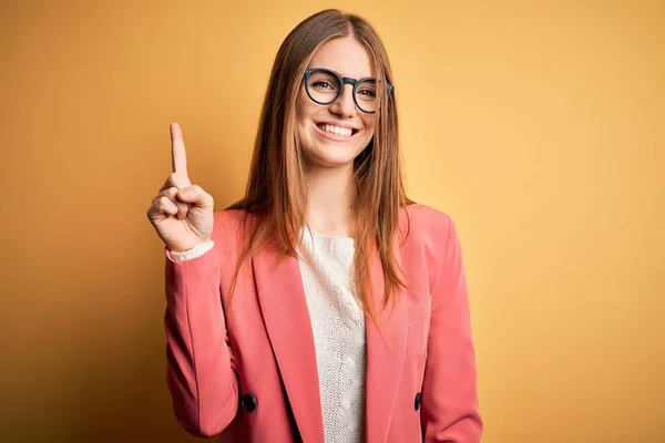 Young Beautiful Redhead Woman Wearing Jacket Glasses Isolated Yellow Background — Stock Photo, Image