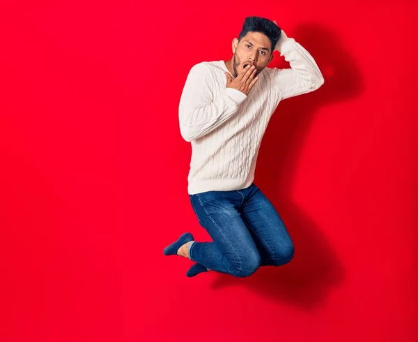 Young Handsome Latin Man Wearing Casual Clothes Smiling Happy Jumping — Stock Photo, Image