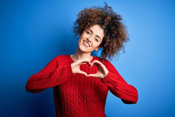 Young Beautiful Woman Curly Hair Piercing Wearing Casual Red Sweater — Stock Photo, Image