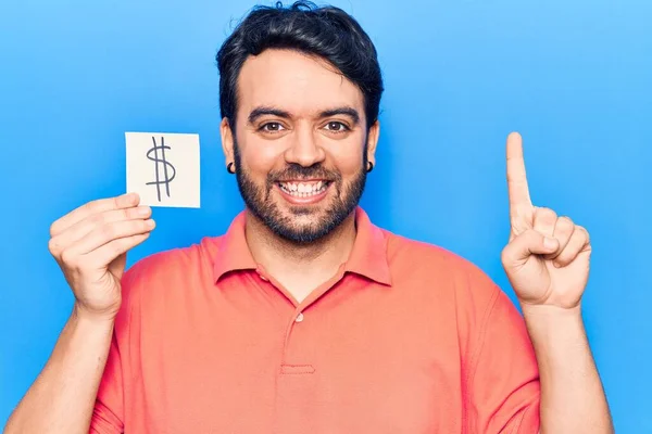 Jovem Hispânico Segurando Dólar Símbolo Lembrete Papel Sorrindo Com Uma — Fotografia de Stock