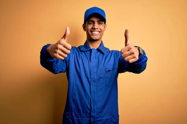 Young African American Mechanic Man Wearing Blue Uniform Cap Yellow — Stock Photo, Image