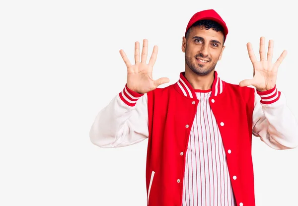 Joven Hombre Hispano Con Uniforme Béisbol Mostrando Señalando Con Los —  Fotos de Stock