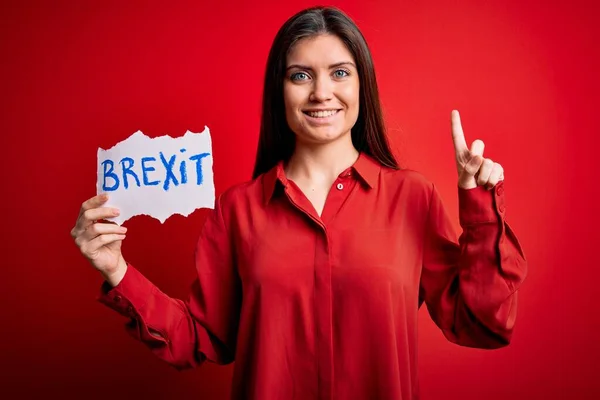 Young Beautiful Woman Blue Eyes Holding Paper Brexit Message Red — Stock Photo, Image