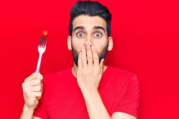 Young Handsome Man Beard Holding Fork Tomato Covering Mouth Hand — Stock Photo, Image