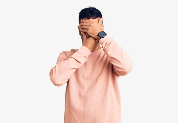 Young Hispanic Man Wearing Casual Clothes Covering Eyes Mouth Hands — Stock Photo, Image