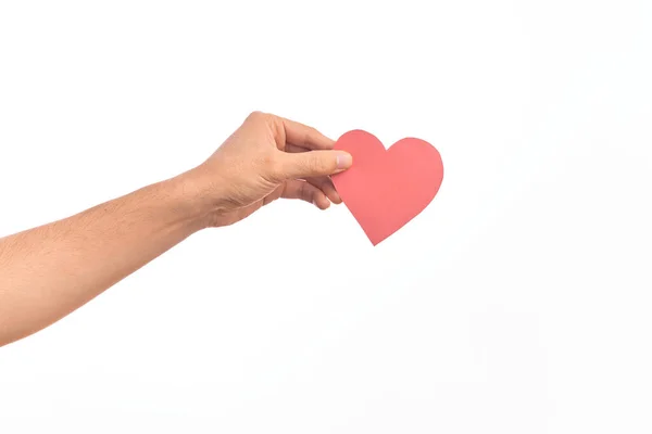 Mão Jovem Caucasiano Segurando Papel Vermelho Forma Coração Sobre Fundo — Fotografia de Stock