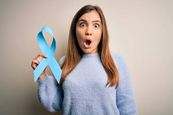 Young Blonde Woman Holding Prostate Cancer Awareness Campaing Blue Ribbon — Stock Photo, Image