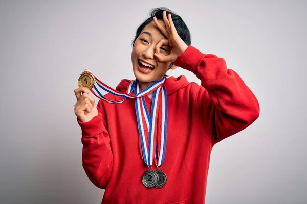 Young Beautiful Asian Girl Winner Wearing Medals Isolated White Background — Stock Photo, Image