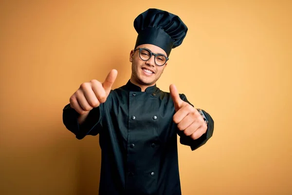 Young Brazilian Chef Man Wearing Cooker Uniform Hat Isolated Yellow — Stock Photo, Image