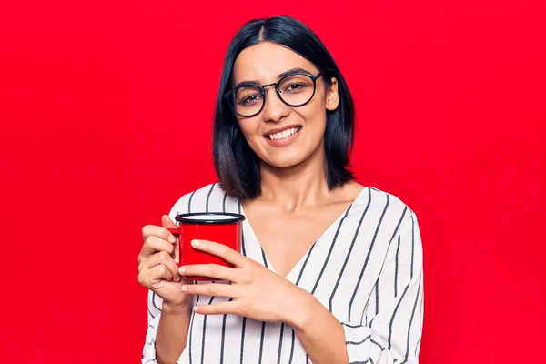 Young Beautiful Latin Woman Wearing Glasses Holding Coffee Looking Positive — Stock Photo, Image