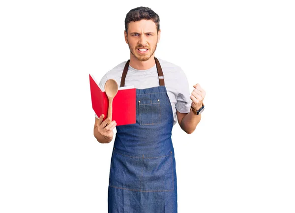 Handsome Young Man Bear Wearing Professional Baker Apron Reading Cooking — Stock Photo, Image