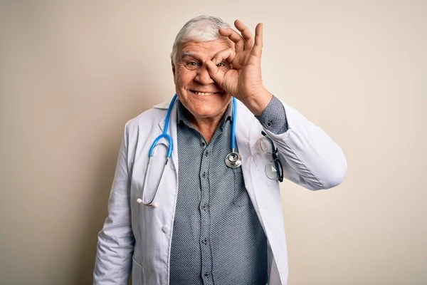 Senior Handsome Hoary Doctor Man Wearing Coat Stethoscope White Background — Stock Photo, Image