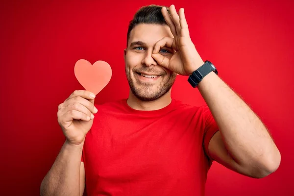 Young Romantic Man Blue Eyes Holding Red Heart Paper Shaped — Stock Photo, Image
