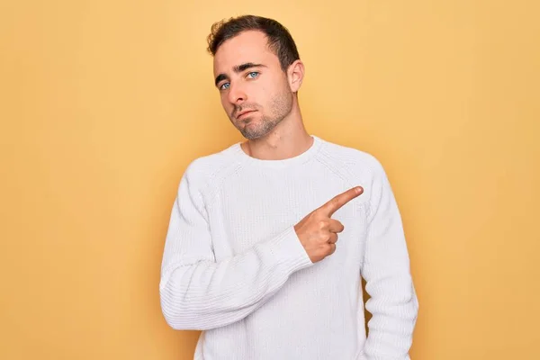 Young Handsome Man Blue Eyes Wearing Casual Sweater Standing Yellow — Stock Photo, Image