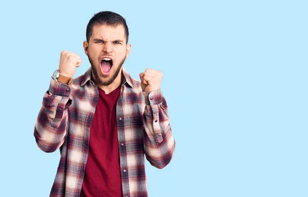 Young Handsome Man Wearing Casual Shirt Angry Mad Raising Fists — Stock Photo, Image